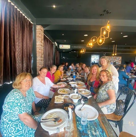 Large group enjoying the unlimited buffet at Bistro 1427 Madurai